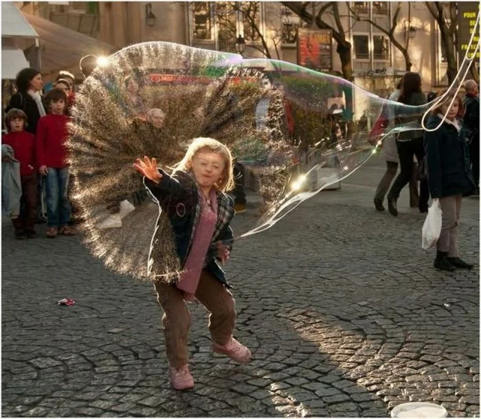 Girl popping a bubble