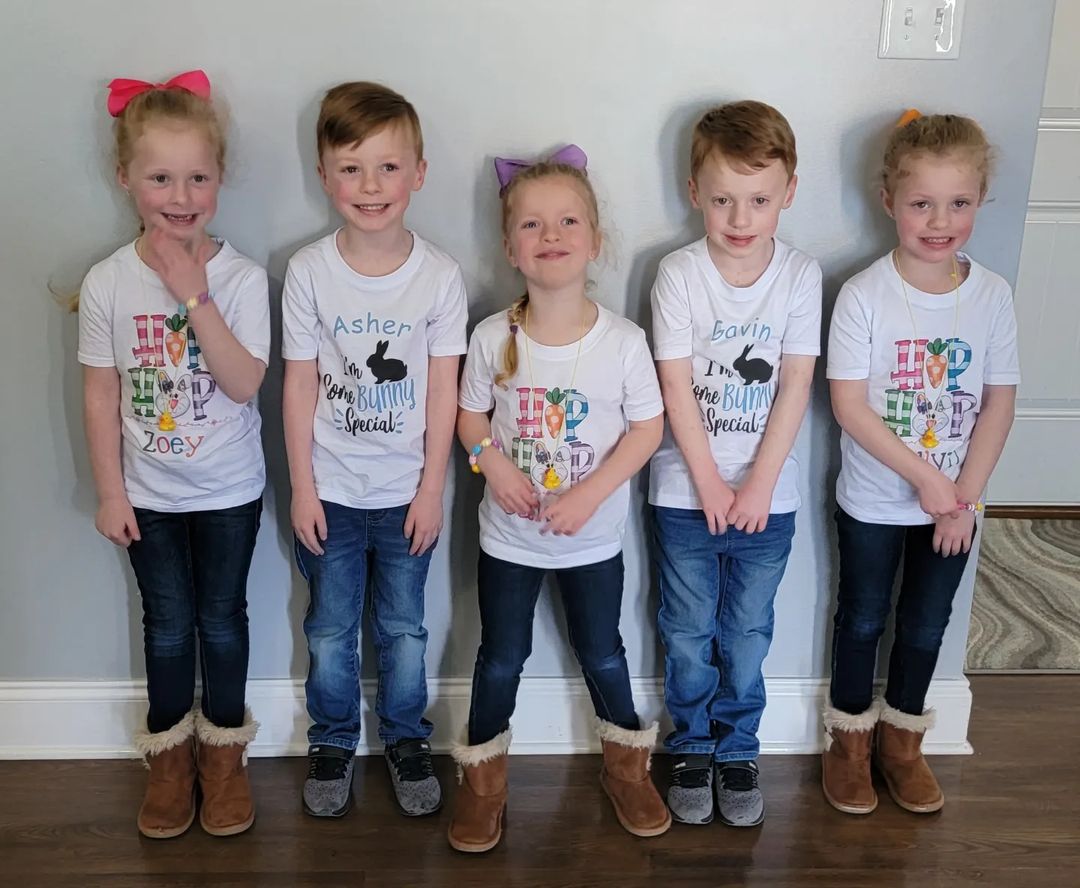 A Father Of Five Walks His Quintuplets With Leashes